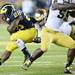 Michigan running back Fitzgerald Toussaint runs the ball during the second half at Michigan Stadium on Saturday, September 7, 2013. Melanie Maxwell | AnnArbor.com
